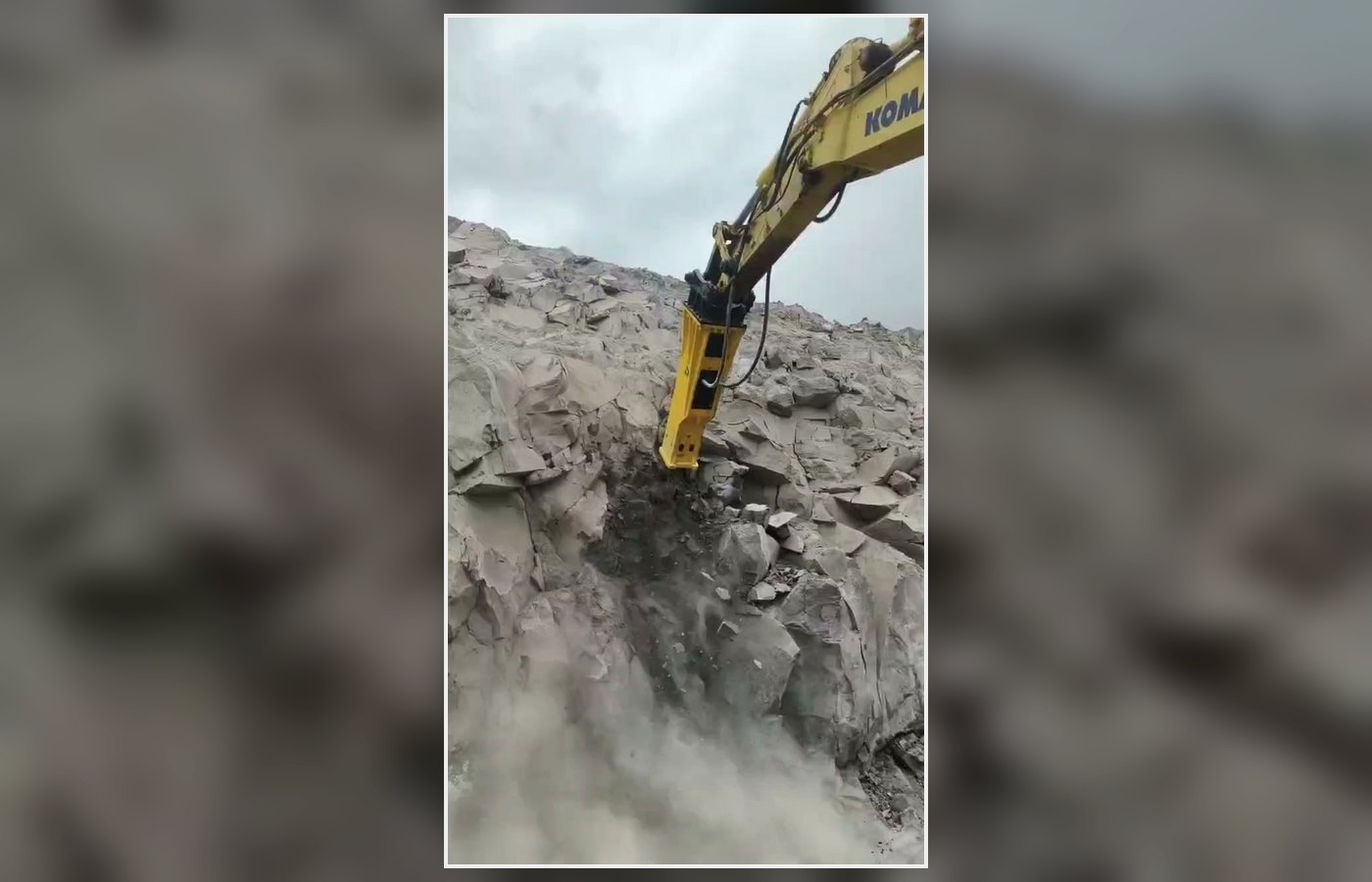 Hydraulic breaker working on rough rock ground